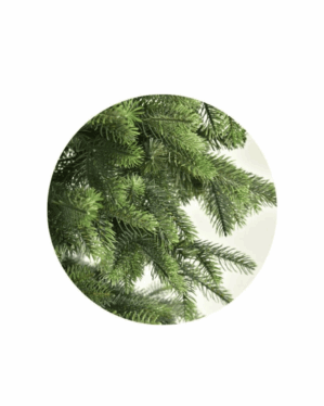 Nærbillede af grenene på et kunstigt oregon juletræ med grene i PE og PVC mix.
