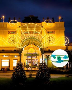 Professionel julebelysning dekorerer Café de Paris' facade med varm hvide LED-lys. Indsat billede viser grøn B22-fatning på grøn kabel til installation.
